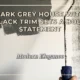 Modern Elegance: Dark Grey House with Black Trim Sets a Bold Statement